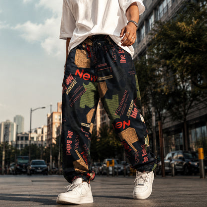 Loose Black News Text Jogger Breathable Casual Harem Pants For Men & Women